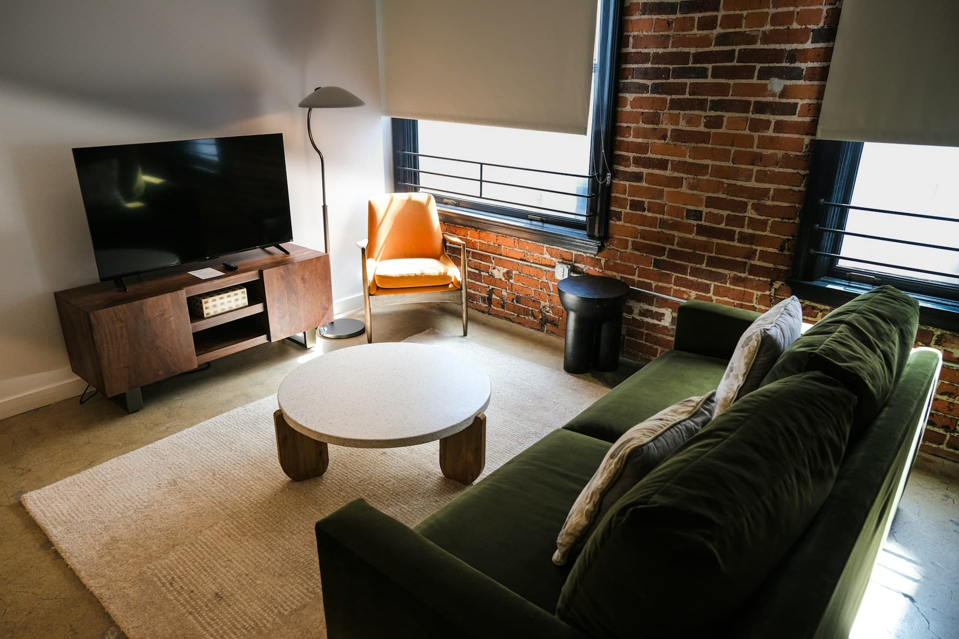 The same living room reimagined by Renovation AI in five different styles.
